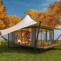 Glamping Tent Built for Four-Season Retreats, Conical Canvas Design, Laminated Spruce Frame, Panoramic Glass