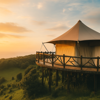 Glamping Tent Built for Four-Season Retreats, Conical Canvas Design, Laminated Spruce Frame, Panoramic Glass